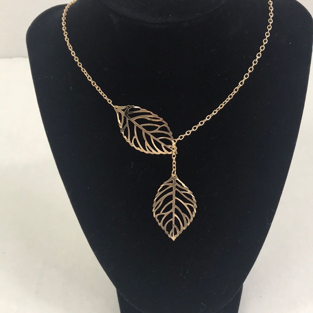 Gold color double leaf 18” necklace. NWOT